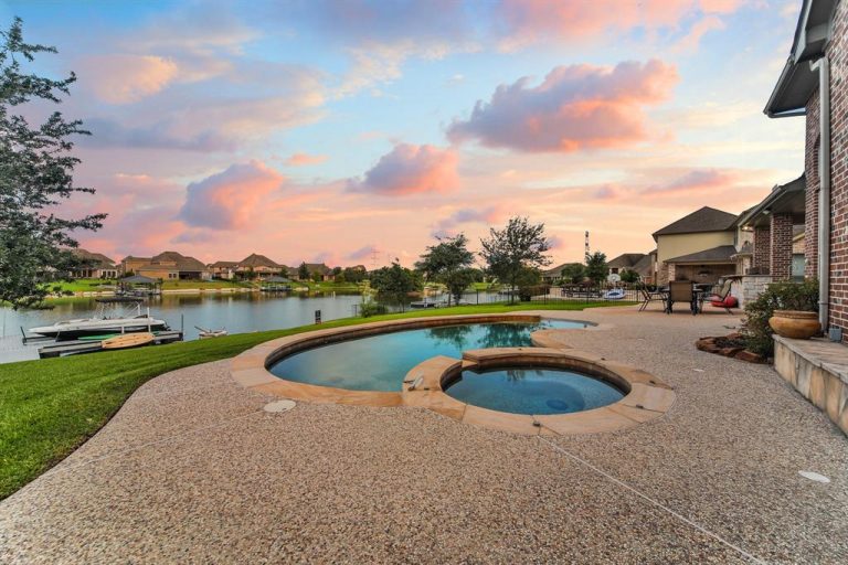 Waterfront Masterpiece in Towne Lake Portfolio Real Estate Luxury